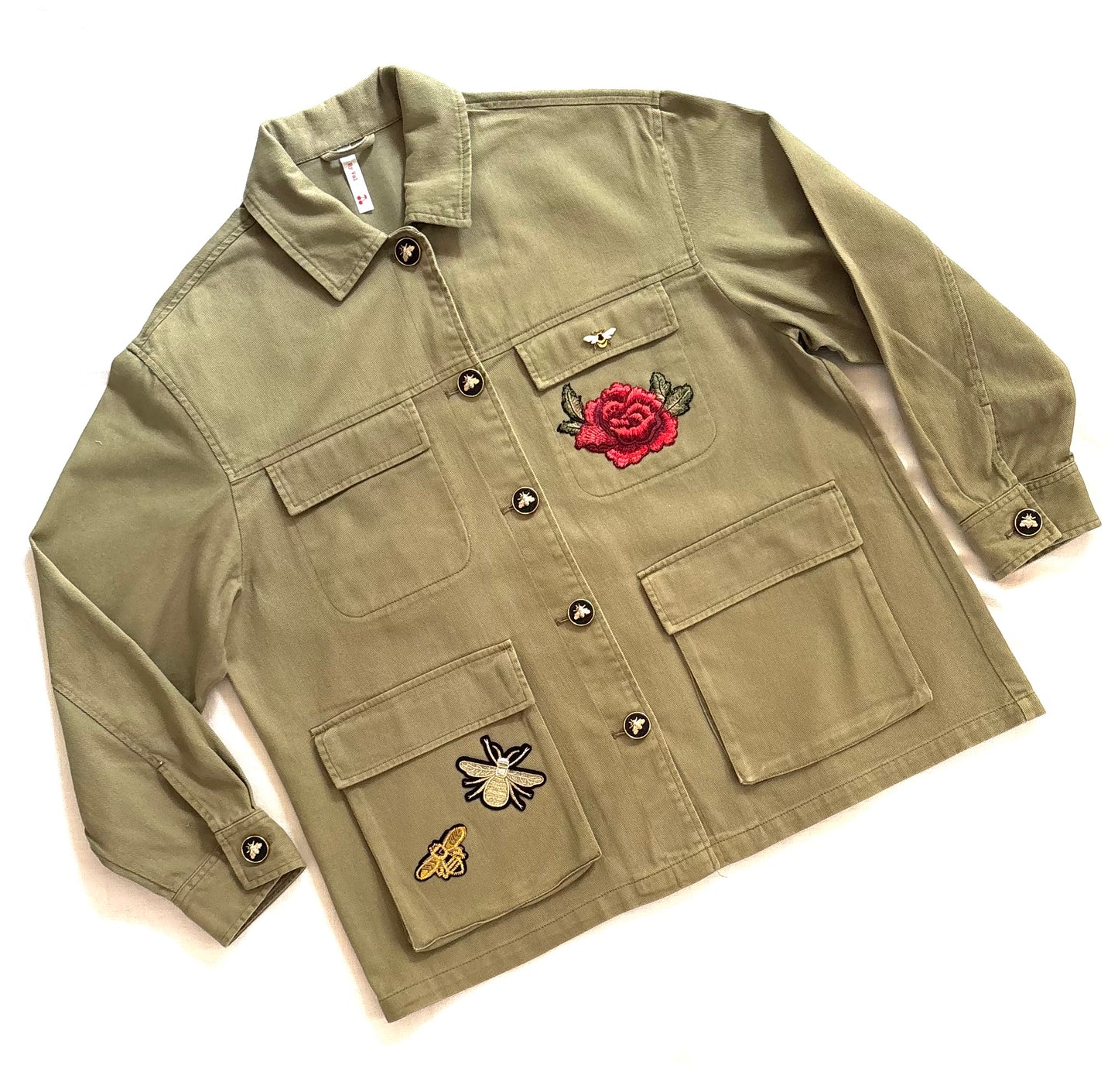 Veste kaki et fleurs